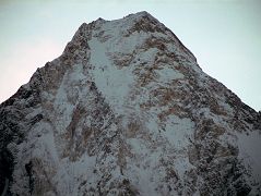 20 Gasherbrum IV Close Up At Sunrise From Concordia Gasherbrum IV close up at sunrise from Concordia. On June 22, 1986 Greg Child, Tim Mcartney-Snape, and Tom Hargis climbed to the North Summit and traversed 450m horizontally to the true Gasherbrum IV Summit, completing the first ascent of the Gasherbrum IV Northwest Ridge. �We functioned as a single being. Now on the summit, that being, drunk with euphoria, felt suddenly as if it had been merged with sky and mountain as well to become a single, elemental entity.� - Thin Air: Encounters In The Himalaya by Greg Child.